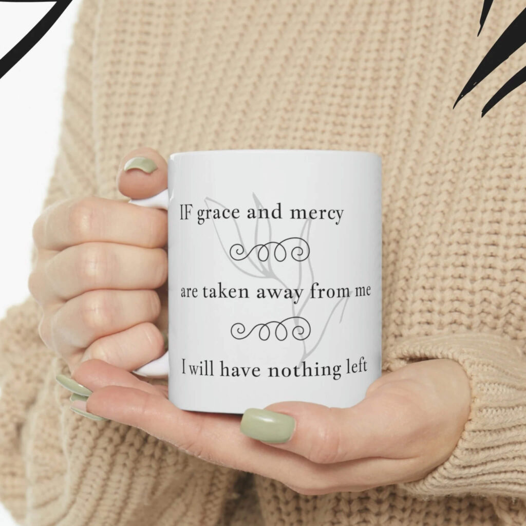 The image features a woman wearing a sweatshirt and a mug that reads "grace and mercy," emphasizing the importance of kindness.